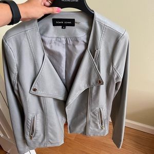 Black Rivet size medium grey leather jacket. In perfect condition. Zip up.